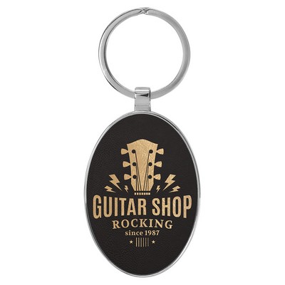 3" x 1 3/4" Leatherette/Metal Black/Gold Oval Keychain